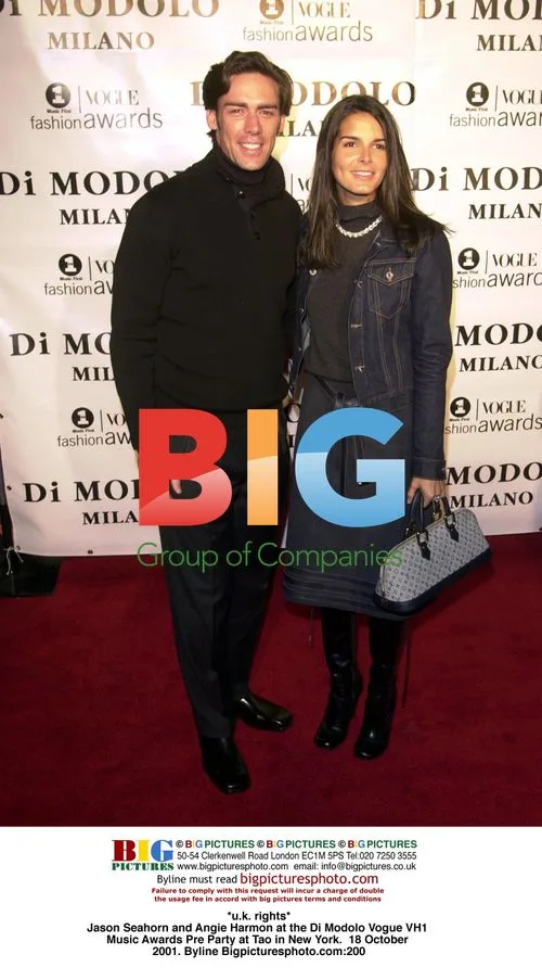 Jason Seahorn and Angie Harmon at Di Mododo VH1 Music Awards Party