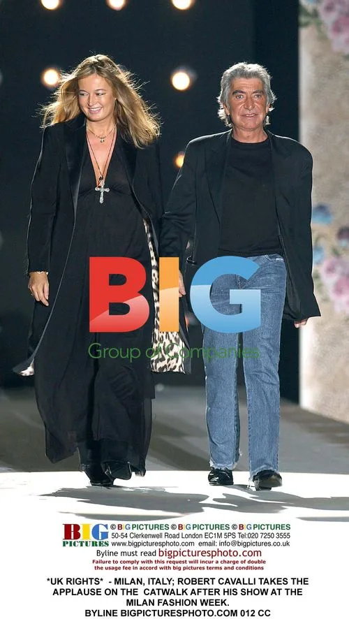 Robert Cavalli takes applause after show at Milan Fashion Week