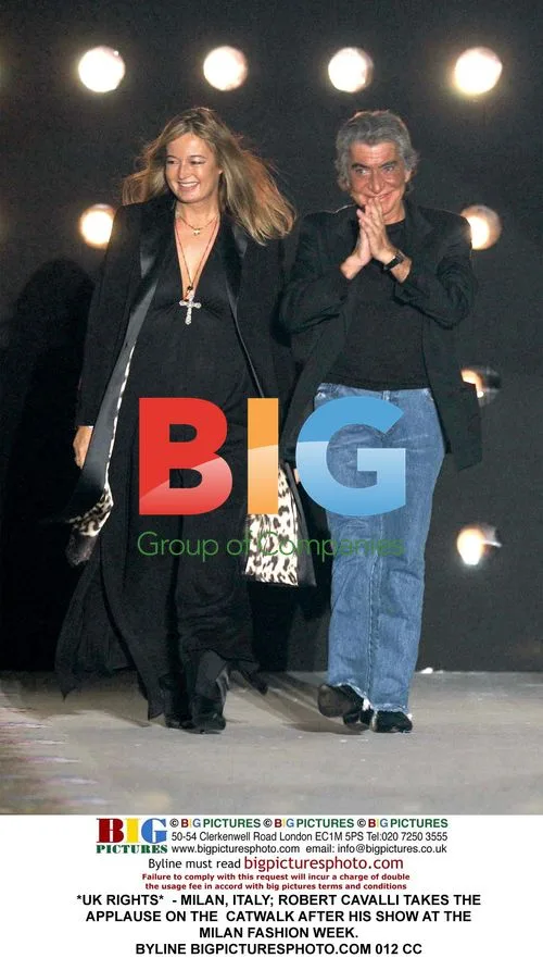 Robert Cavalli takes applause after Milan Fashion Week show