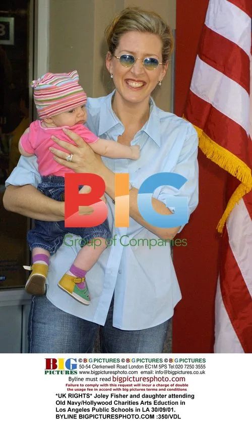 Joley Fisher and daughter at Old Navy/Hollywood charity event