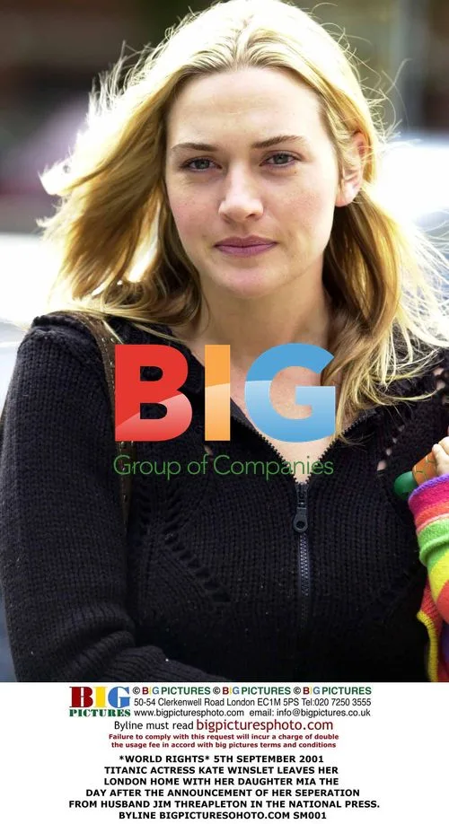 Kate Winslet leaves home with daughter