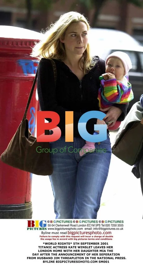 Kate Winslet Leaves Home with Daughter