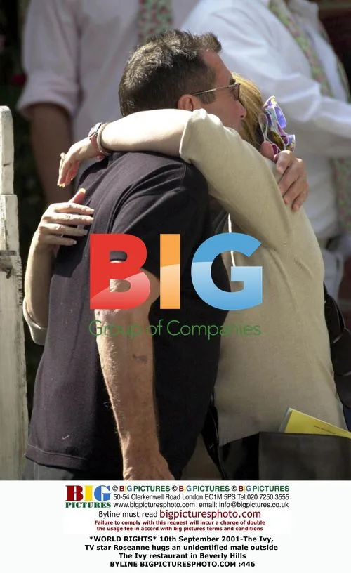 Roseanne hugs man outside The Ivy in Beverly Hills