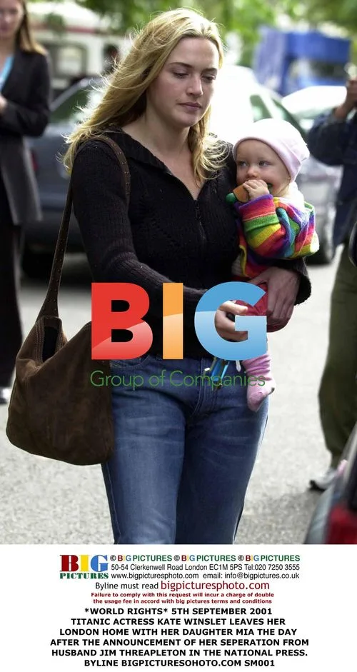 Kate Winslet Leaves London Home with Daughter