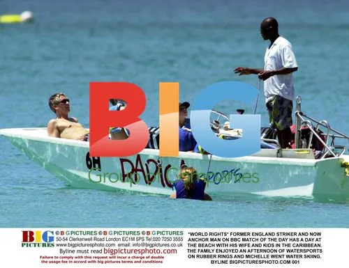 Former England Striker Enjoys Caribbean Beach Day