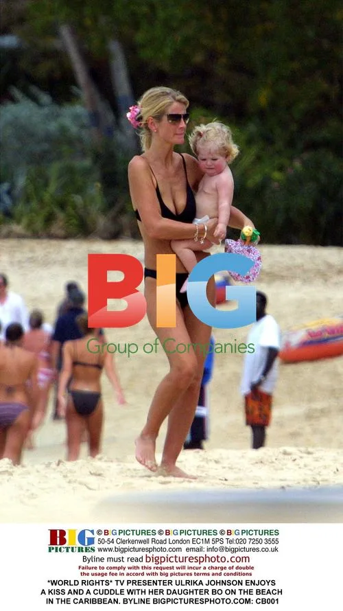 Ulrika Johnson and Daughter on Caribbean Beach