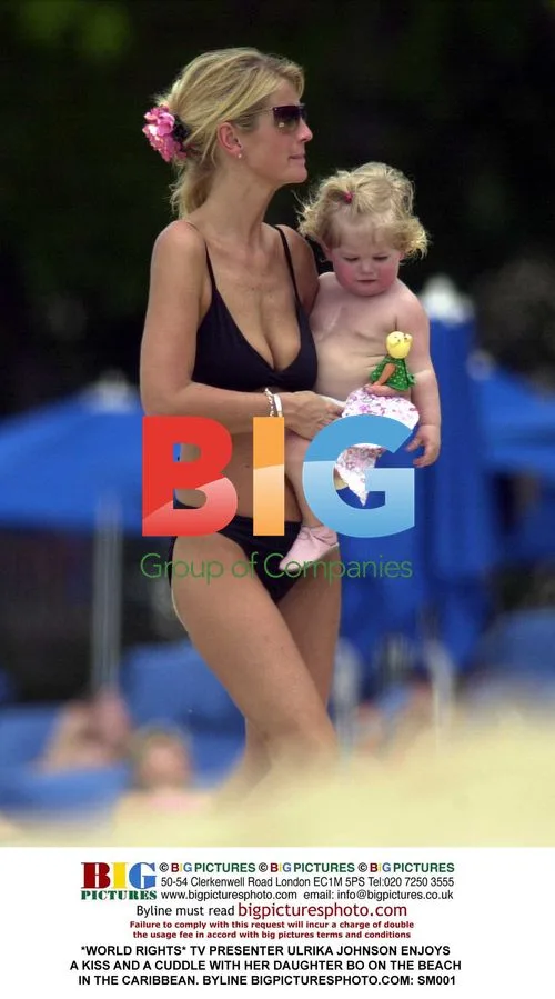 Ulrika Johnson Enjoys Beach Time with Daughter
