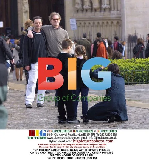 Kevin Kline and Family Visit Notre Dame in Paris