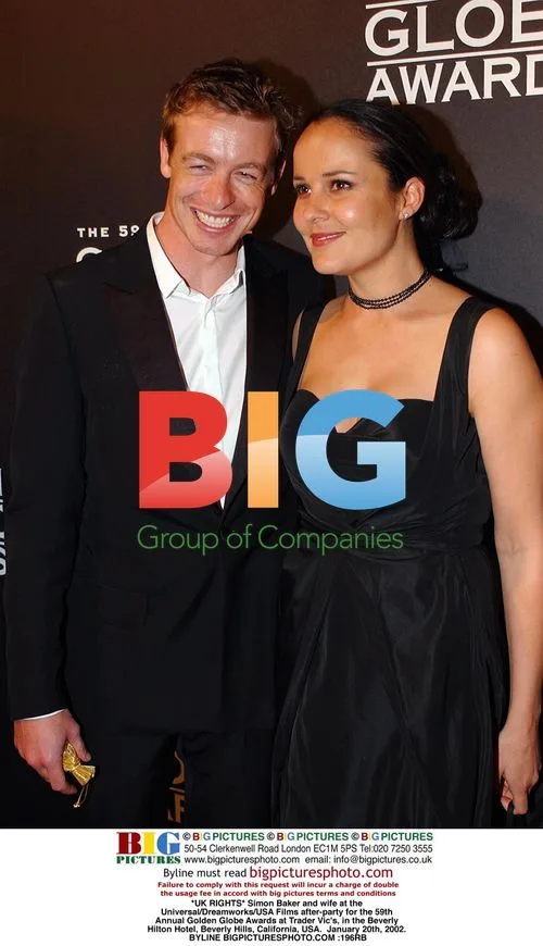 Simon Baker and wife at Golden Globes after-party