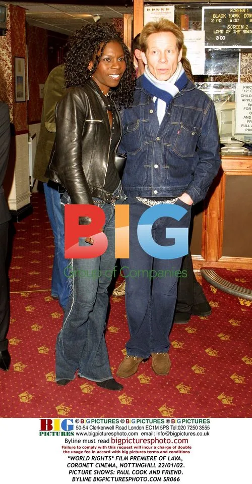 PAUL COOK AND FRIEND AT LAVA FILM PREMIERE
