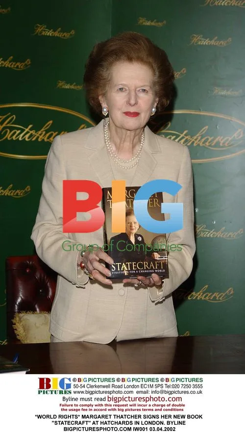 Margaret Thatcher signs book "Statecraft" in London