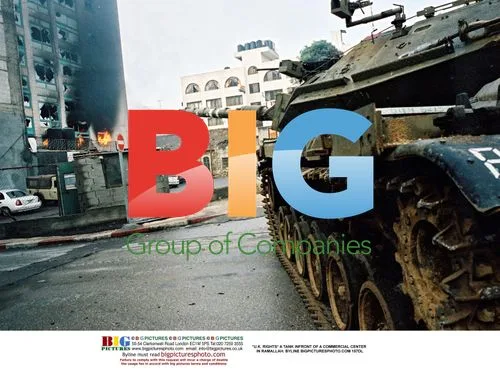 Tank in front of Ramallah commercial center