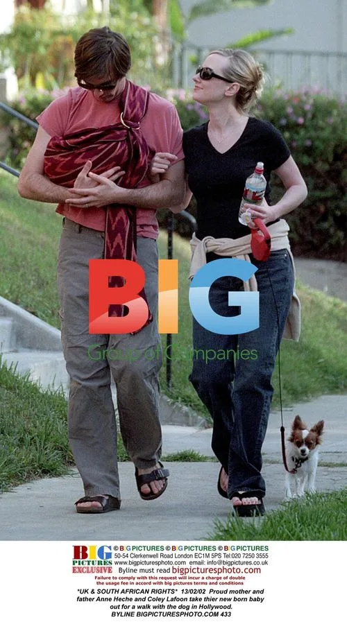 Anne Heche and Coley Lafoon take newborn for walk