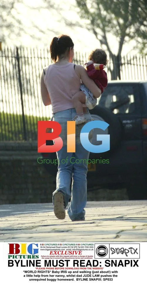 Baby Iris Walking with Nanny and Jude Law