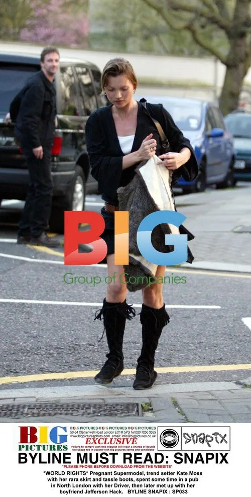 Kate Moss in rara skirt with boyfriend