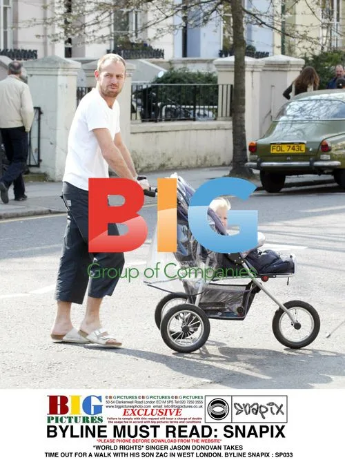 Jason Donovan and son Zac out for a walk