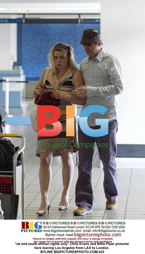 Chris Evans and Billie Piper depart LAX