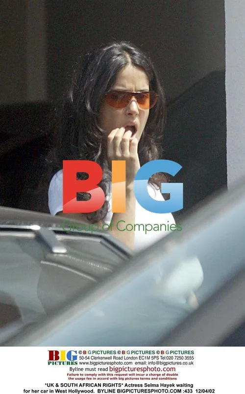 Selma Hayek waits for car in WeHo