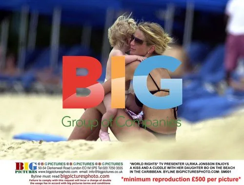 Ulrika Jonsson Kisses Daughter Bo on Caribbean Beach