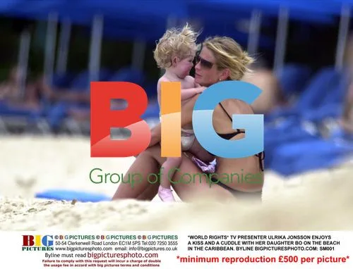 Ulrika Jonsson and daughter Bo on Caribbean beach