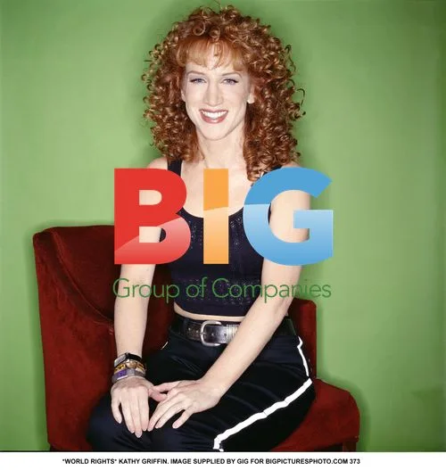 Kathy Griffin in blue top and black trousers