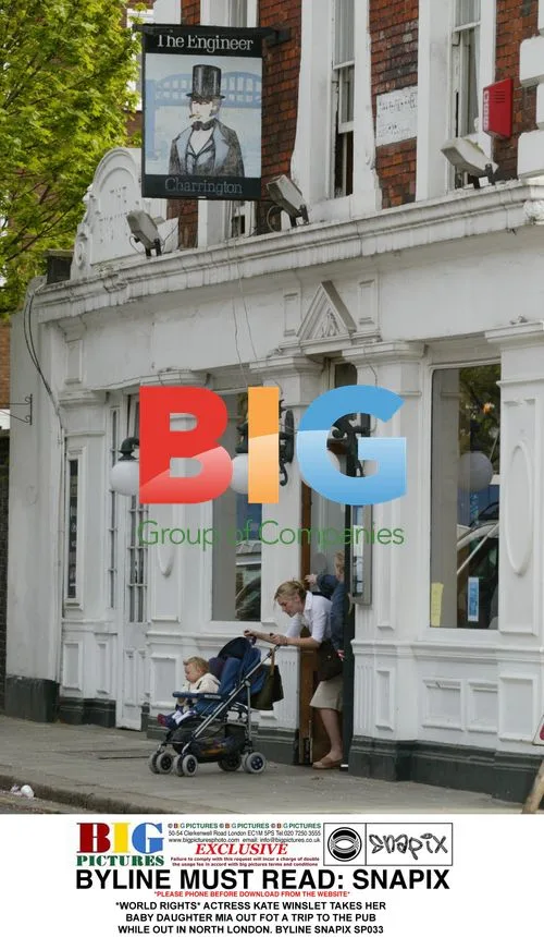 Kate Winslet takes baby Mia to the pub in North London
