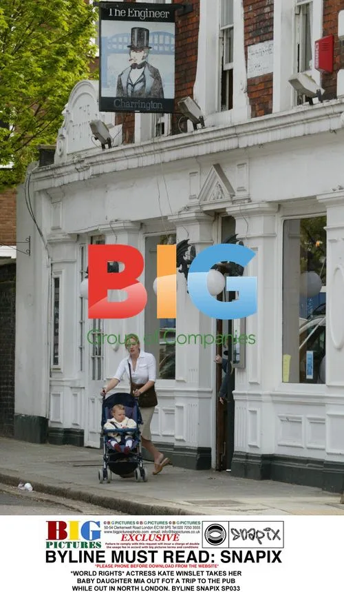 Kate Winslet takes baby Mia to pub in North London
