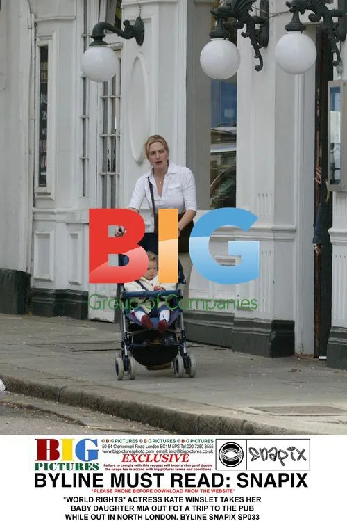Kate Winslet out with baby daughter Mia in North London
