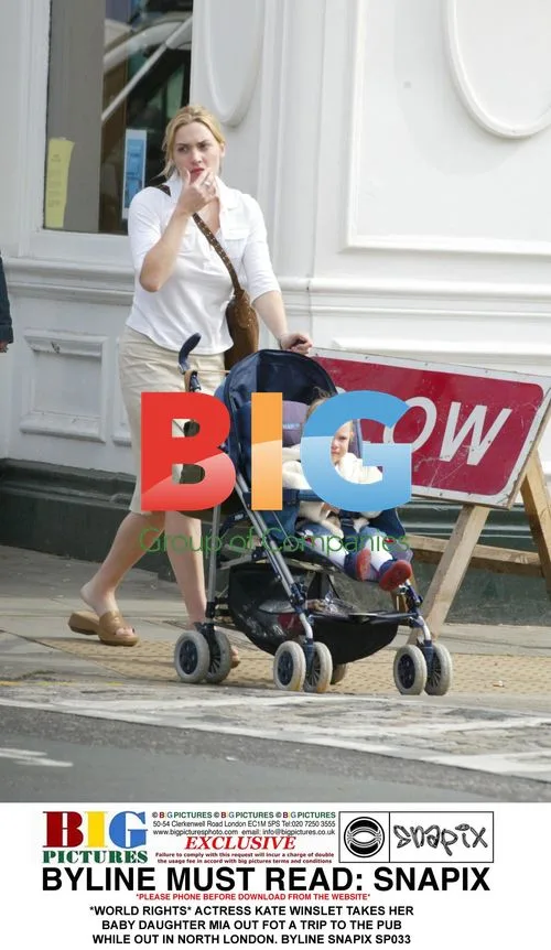 Kate Winslet takes baby Mia to the pub in North London
