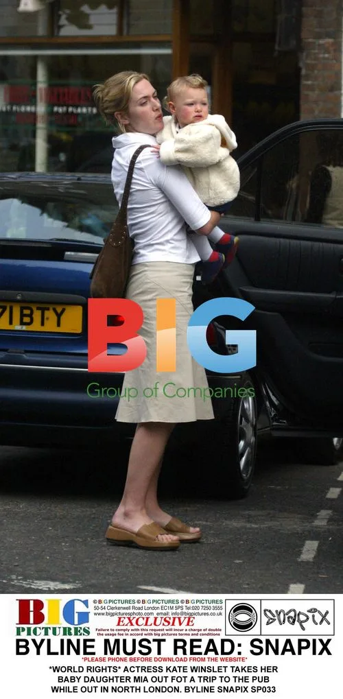 Kate Winslet takes baby Mia to pub in North London