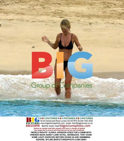 Ulrika Johnson swims with friends in Barbados