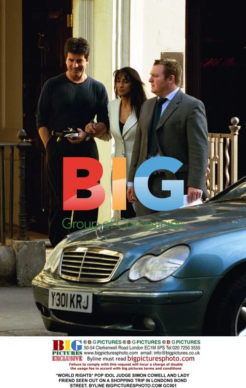 Simon Cowell and friend spotted shopping in London