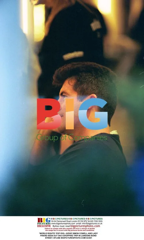 Simon Cowell and Lady Friend Shopping in London