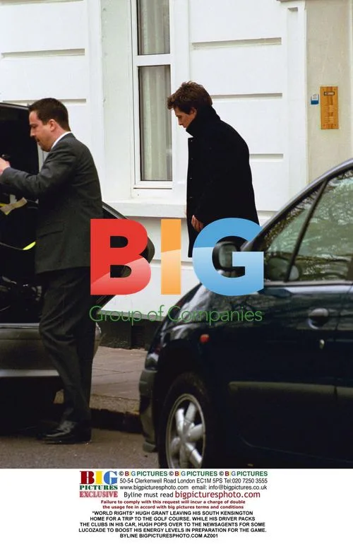 Hugh Grant Leaving for Golf