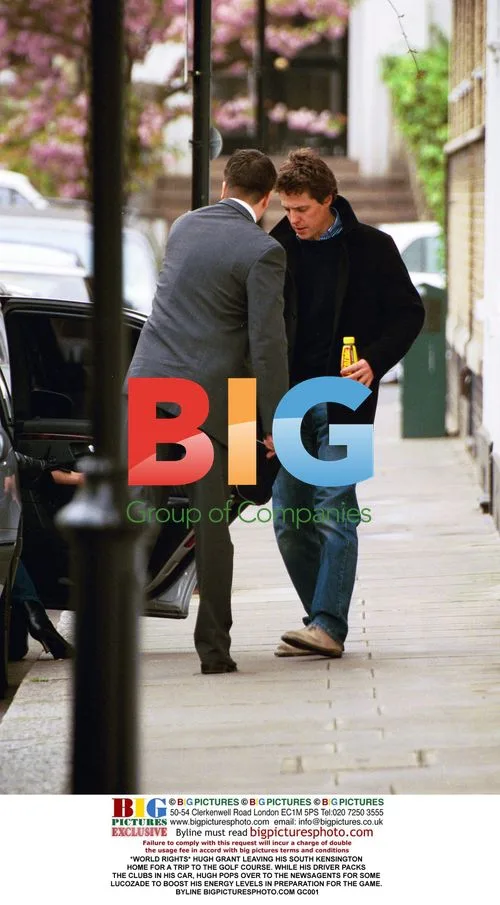 Hugh Grant leaves for golf outing