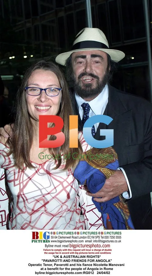 Pavarotti and Fiancée at Angola Benefit