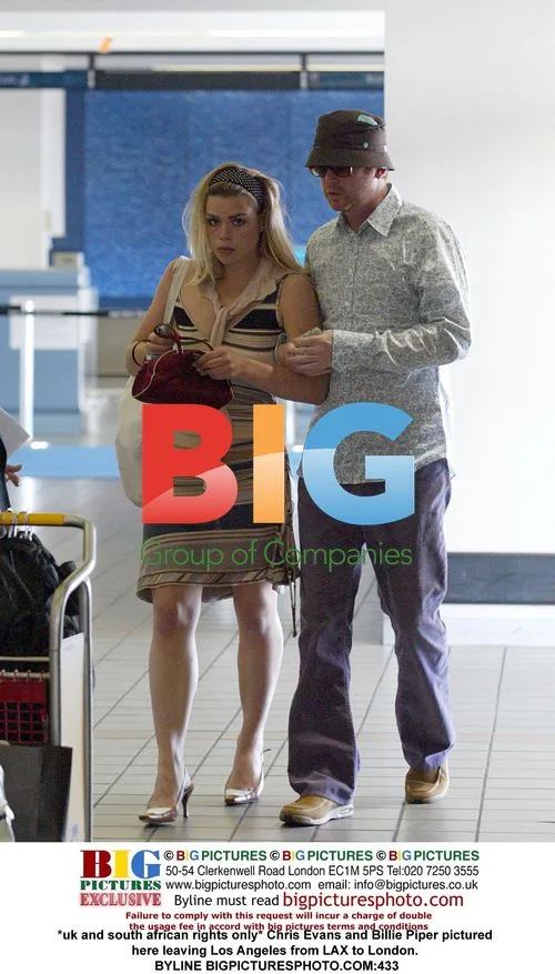 Chris Evans and Billie Piper Depart LAX