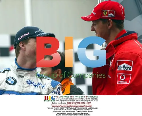Schumacher Brothers Share Laugh at Spanish GP