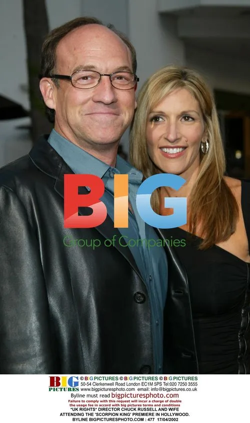 DIRECTOR CHUCK RUSSELL AND WIFE AT 'SCORPION KING' PREMIERE