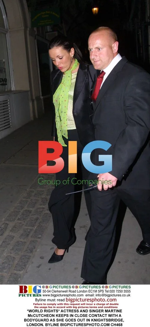 Martine McCutcheon with bodyguard in London