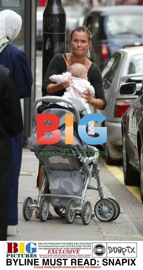 Emanuel Petit and family out shopping in London
