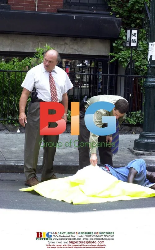 Dennis Franz and Mark-Paul Gosselaar on NYPD Blue set
