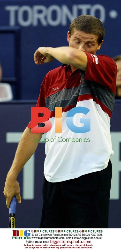 Jiri Novak Sweats After Loss to Roddick