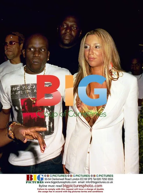 Rapper Mark Morrison with party girl Emma Jones