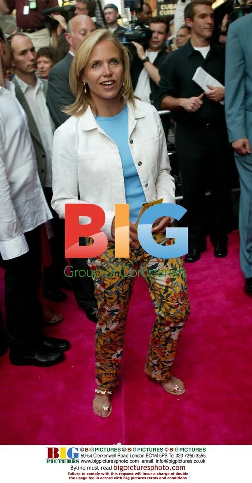 Woman poses on red carpet