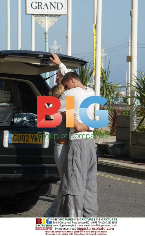 Glamour model Jordon kissing boyfriend in Brighton