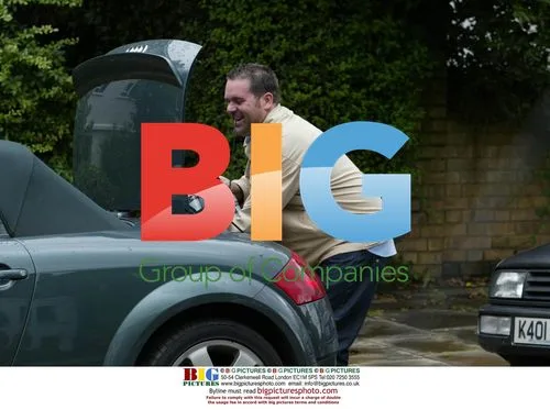 Chris Moyles Loads Car with Beer and Snacks