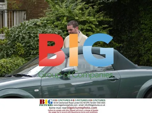 DJ Chris Moyles Sneaks Beer and Snacks to Car