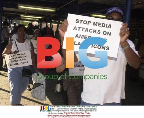 Protestors at Apollo Theatre press conference