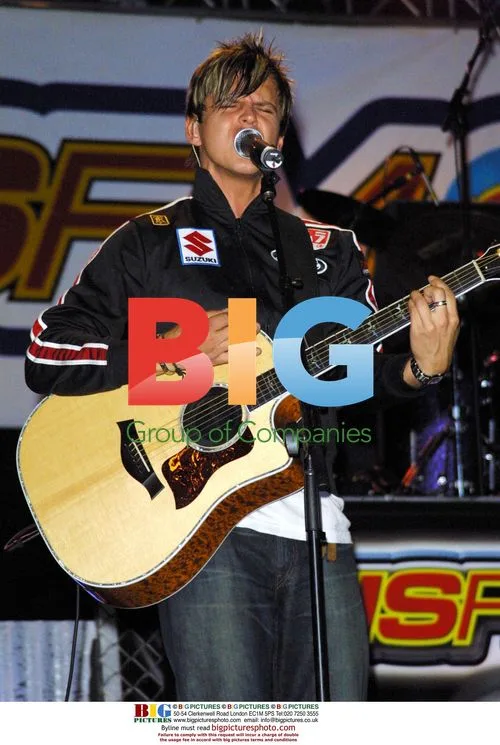 Christian Burns performs at JoJo Jam concert